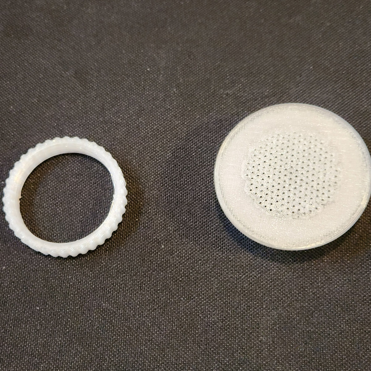 1.5 inch tub vent and its threaded nut, side by side