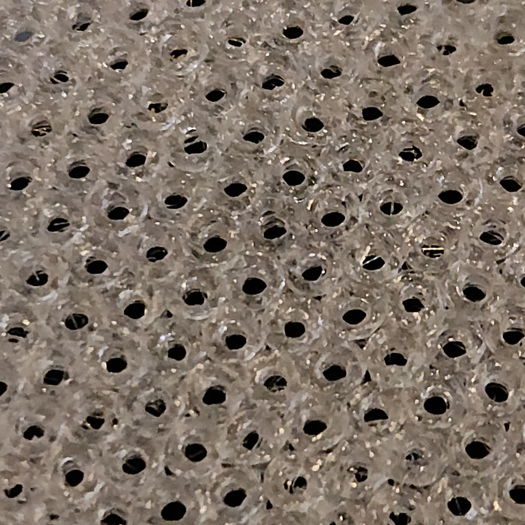 Close-up of the printed hex mesh on a 1.5 inch tub vent